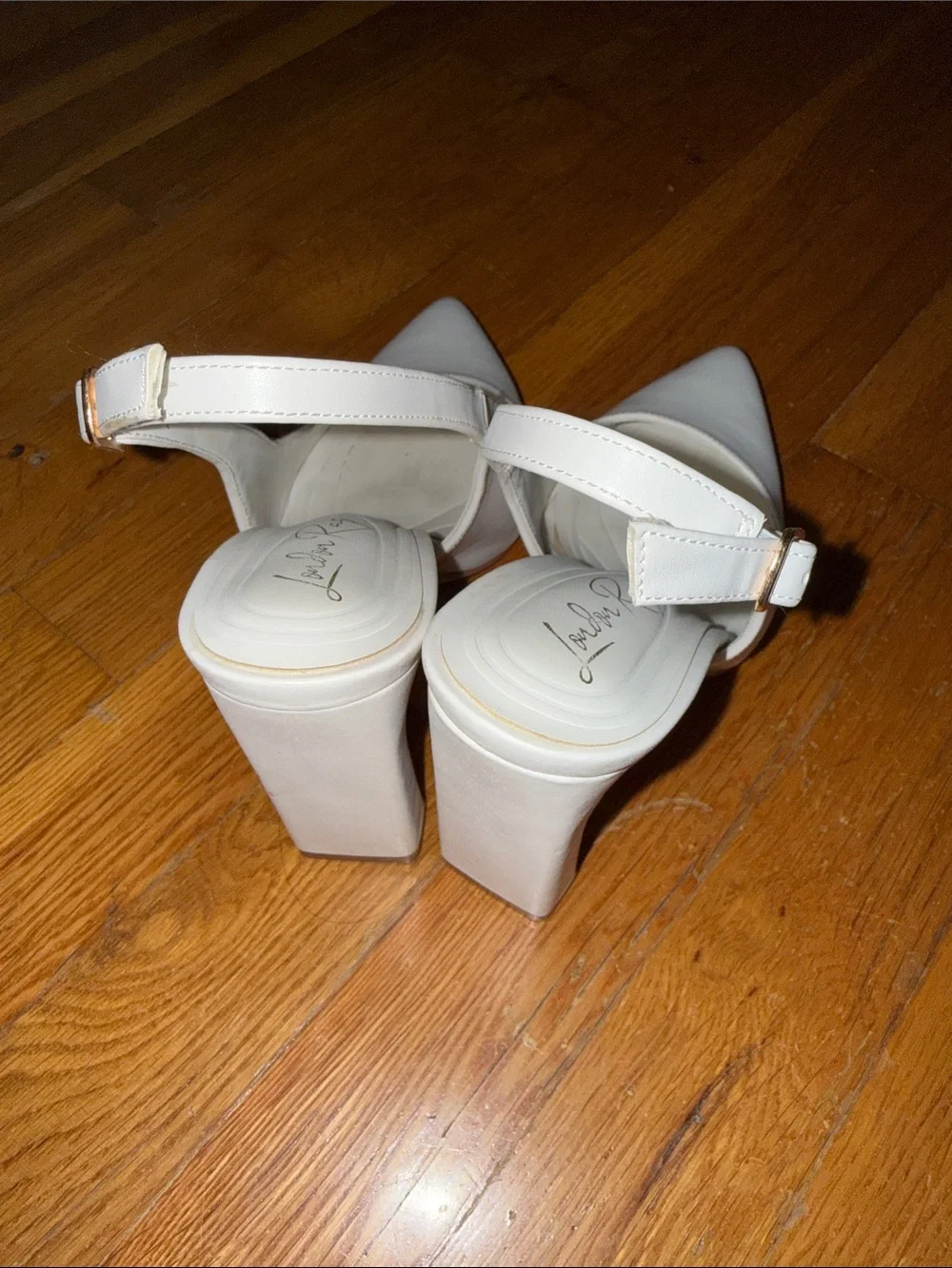 Slingback Pointed Pumps in Ivory by Andrea Rey